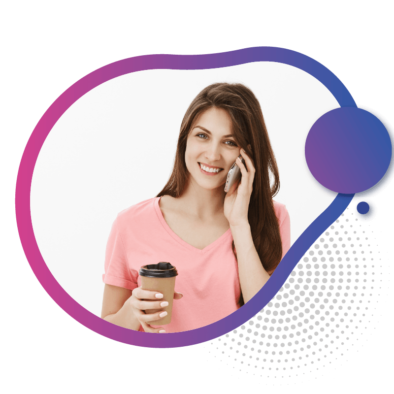 A woman in a pink shirt holds a coffee cup and rests her hand on her cheek, symbolizing the smooth and hassle-free data transfer experience with eSIM technology in Australia.